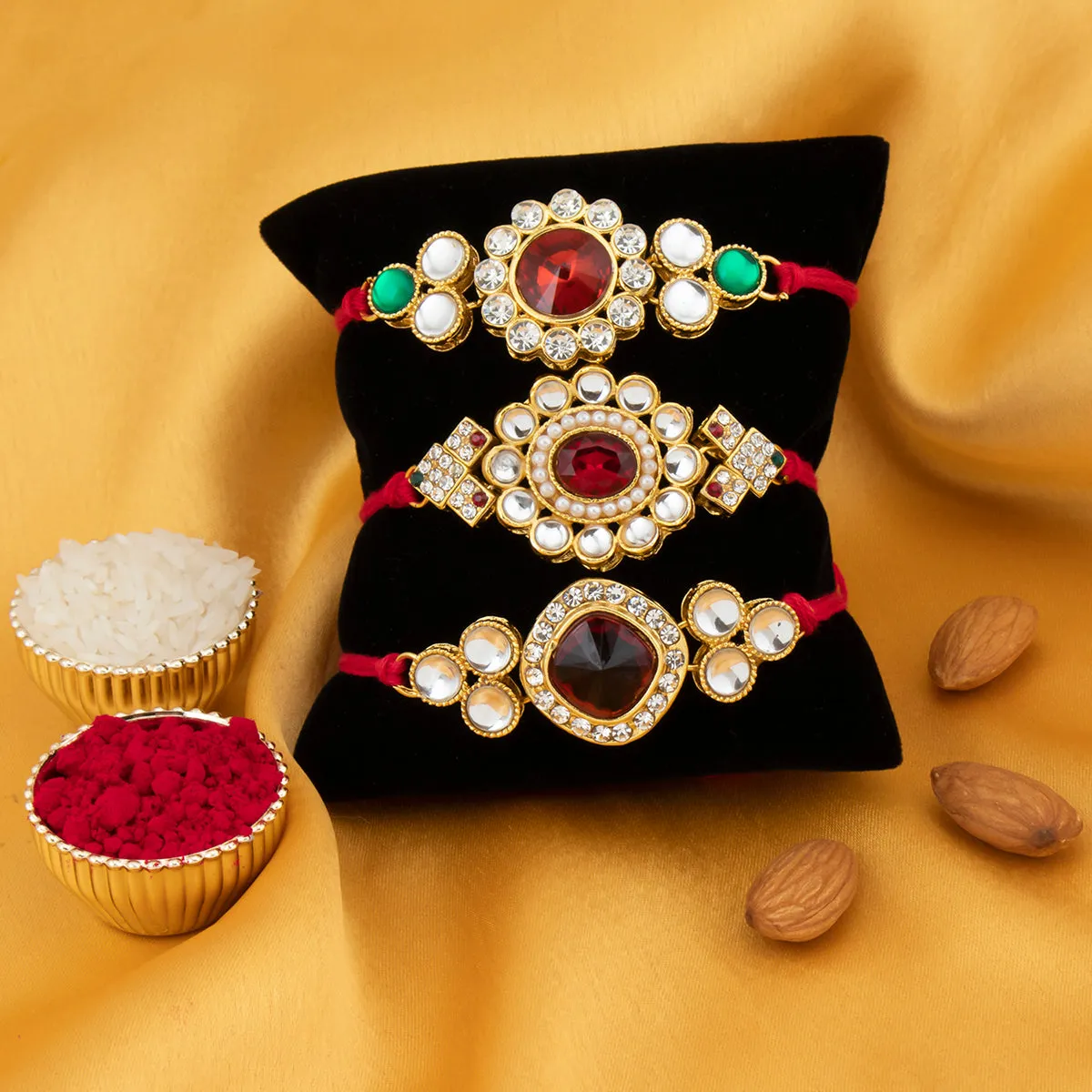 Sukkhi Amazing Gold Plated Kundan Rakhi Combo (Set of 3) with Roli Chawal and Raksha Bandhan Greeting Card For Men